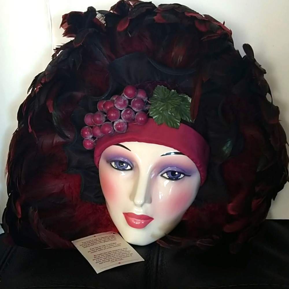 Vintage Clay art porcelain mask with feathers